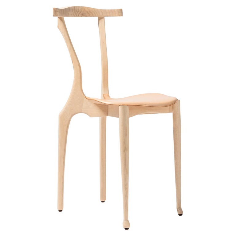 https://a.1stdibscdn.com/21-century-oscar-tusquets-blanca-gaulinetta-armchair-natural-wood-varnished-for-sale/f_30483/f_291368921655385329395/f_29136892_1655385329663_bg_processed.jpg?width=768