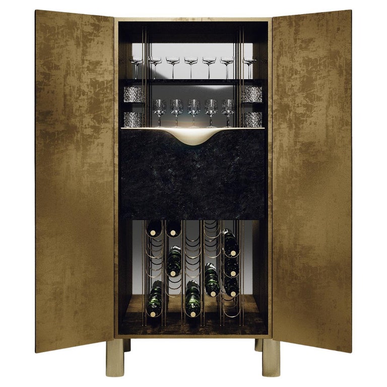 https://a.1stdibscdn.com/shagreen-bar-cabinet-with-bronze-patina-brass-details-by-ry-augousti-for-sale/f_45491/f_294306621656997454773/f_29430662_1656997455222_bg_processed.jpg?width=768