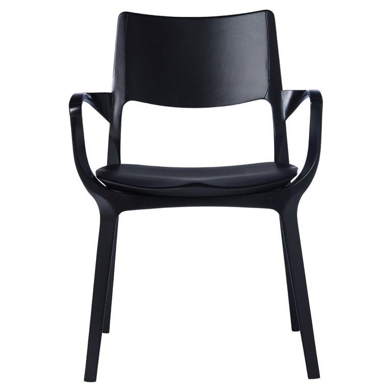 https://a.1stdibscdn.com/post-modern-style-aurora-chair-in-sculpted-black-ebonized-solid-wood-for-sale/f_35593/f_299067221659985256133/f_29906722_1659985257088_bg_processed.jpg?width=768