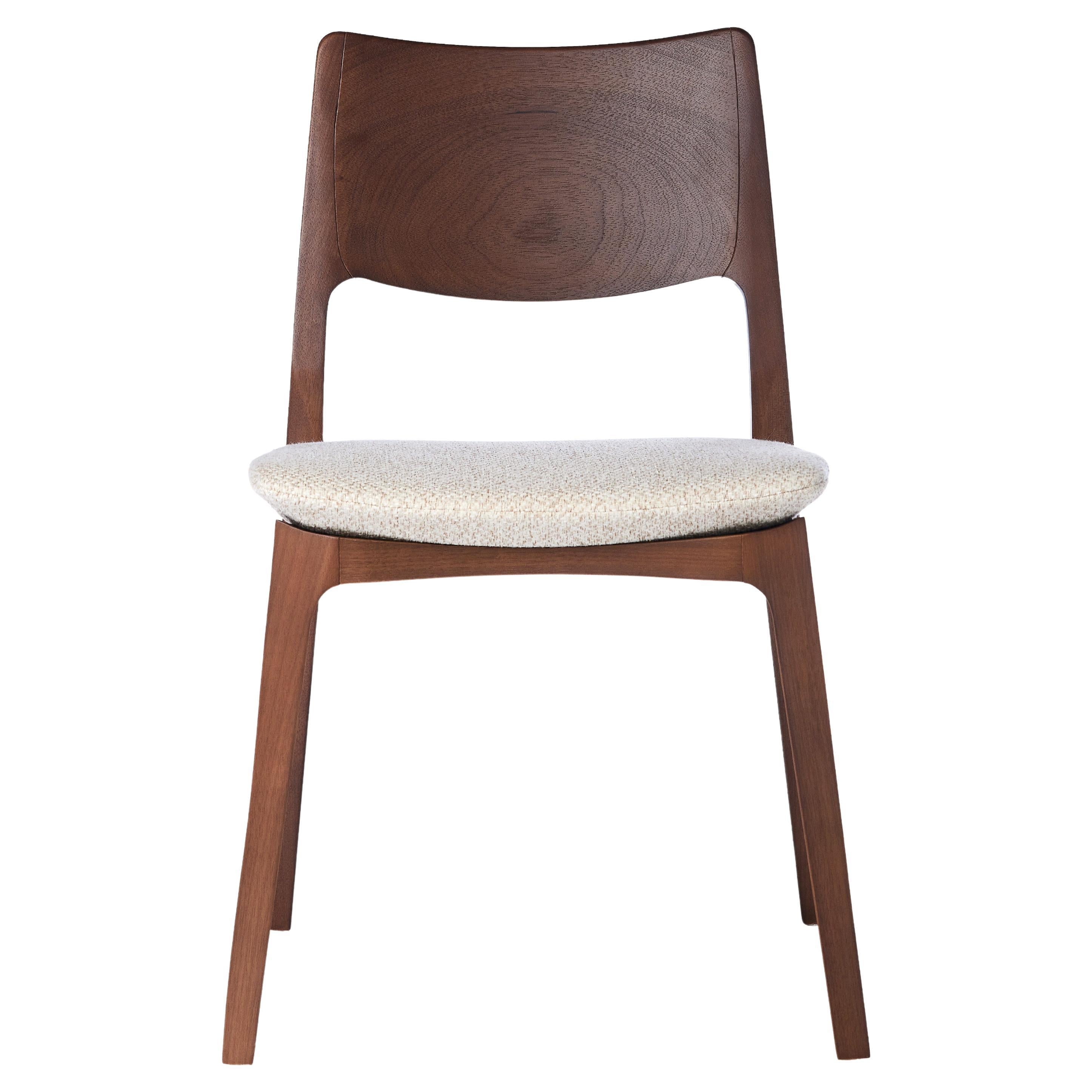 https://a.1stdibscdn.com/modern-style-aurora-chair-sculpted-in-walnut-finish-no-arms-upholstered-seat-for-sale/f_35593/f_299068321659985625624/f_29906832_1659985626593_bg_processed.jpg