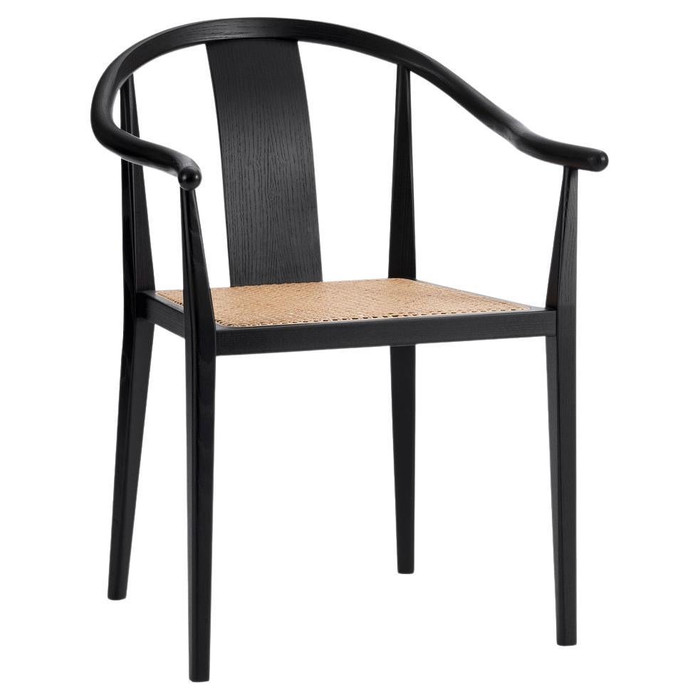https://a.1stdibscdn.com/shanghai-chair-by-norr11-black-oak-natural-rattan-for-sale/f_31233/f_299423221660224168821/f_29942322_1660224169029_bg_processed.jpg