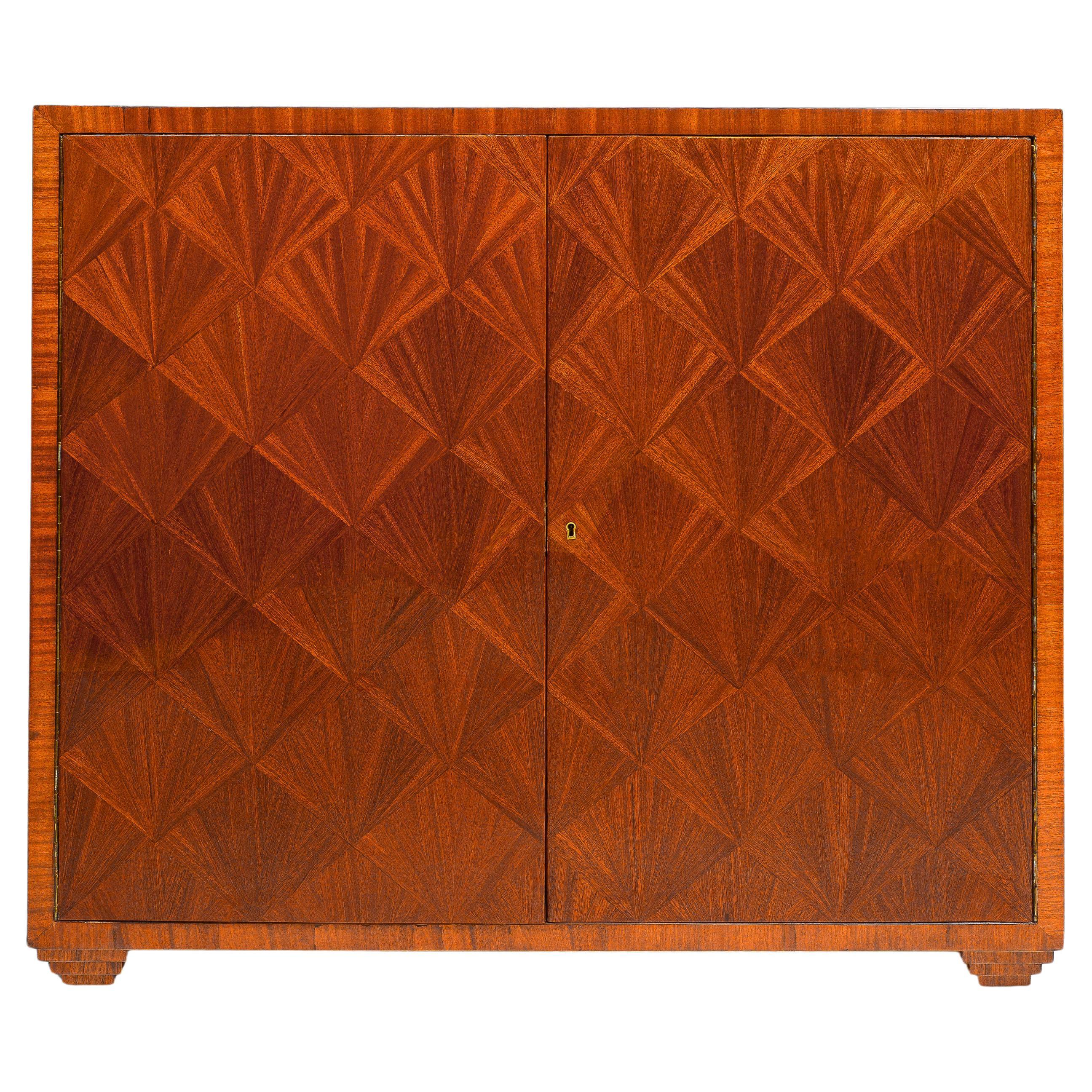 https://a.1stdibscdn.com/vintage-parquetry-cabinet-in-the-jean-michel-frank-manner-for-sale/f_7988/f_299453521660235969898/f_29945352_1660235971720_bg_processed.jpg
