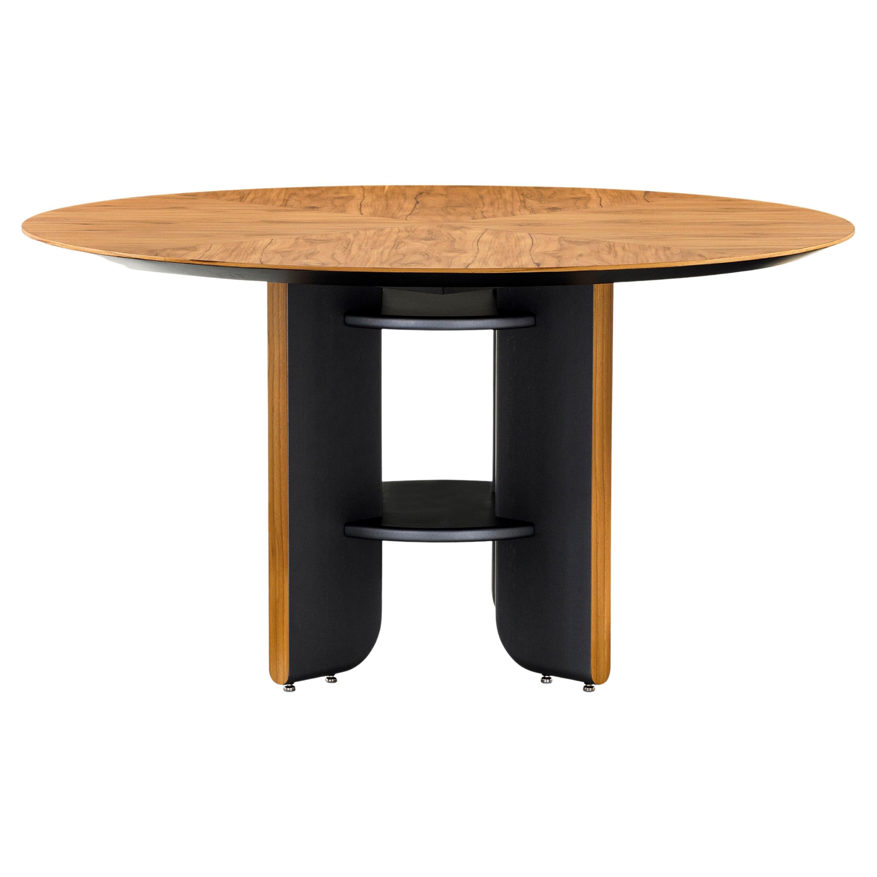 https://a.1stdibscdn.com/moon-55-round-dining-table-with-teak-veneered-top-and-black-wood-legs-for-sale/f_52822/f_301862121661795164368/f_30186212_1661795165268_bg_processed.jpg