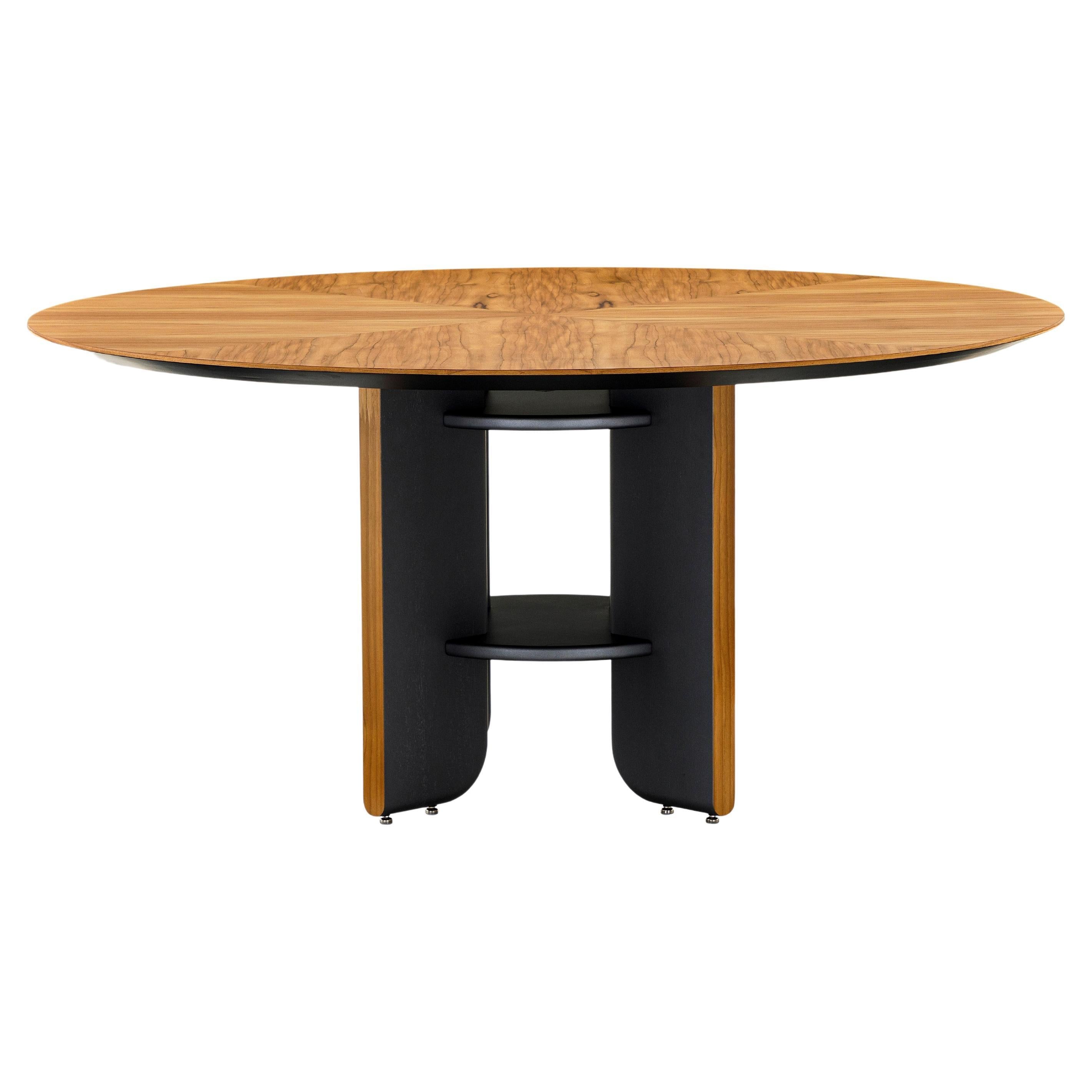 https://a.1stdibscdn.com/moon-63-round-dining-table-with-teak-veneered-top-and-black-wood-legs-for-sale/f_52822/f_301863221661795685024/f_30186322_1661795685804_bg_processed.jpg