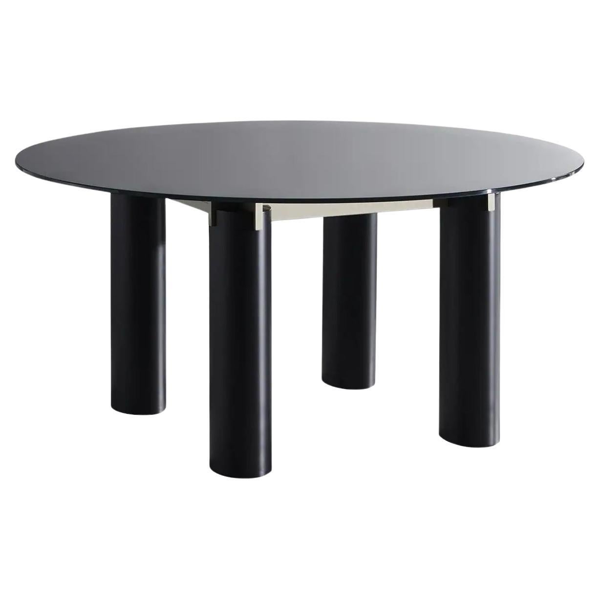 https://a.1stdibscdn.com/sober-round-dining-table-for-sale/f_14282/f_303009221662477370115/f_30300922_1662477370301_bg_processed.jpg
