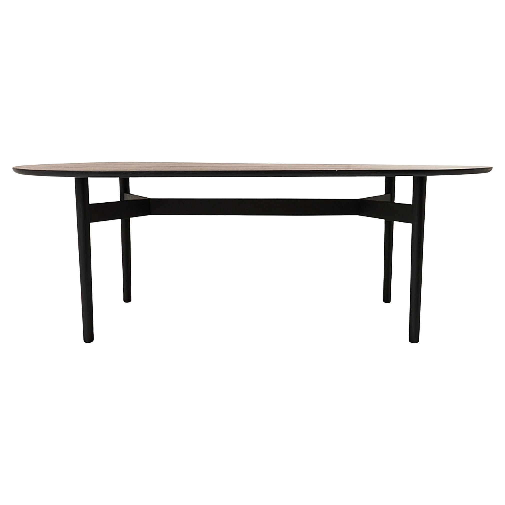 https://a.1stdibscdn.com/schumacher-editions-puffin-84-dining-table-in-soft-black-for-sale/22569652/f_304461121663303652348/f_30446112_1663303652804_bg_processed.jpg