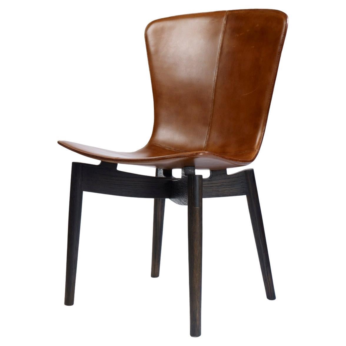 https://a.1stdibscdn.com/shell-chair-leather-upholstery-and-wood-base-for-sale/f_71162/f_307570421665183795485/f_30757042_1665183795787_bg_processed.jpg