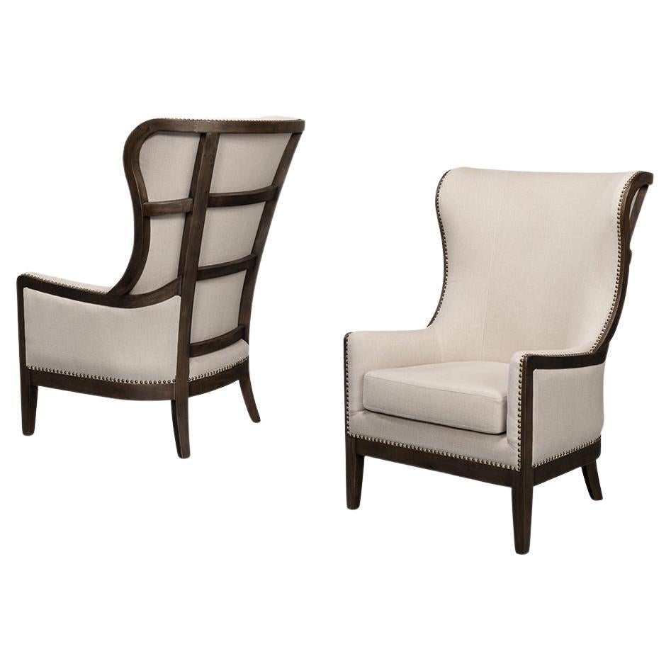 https://a.1stdibscdn.com/updated-modern-classic-wingchair-for-sale/f_8038/f_308117121665531892399/f_30811712_1665531892667_bg_processed.jpg