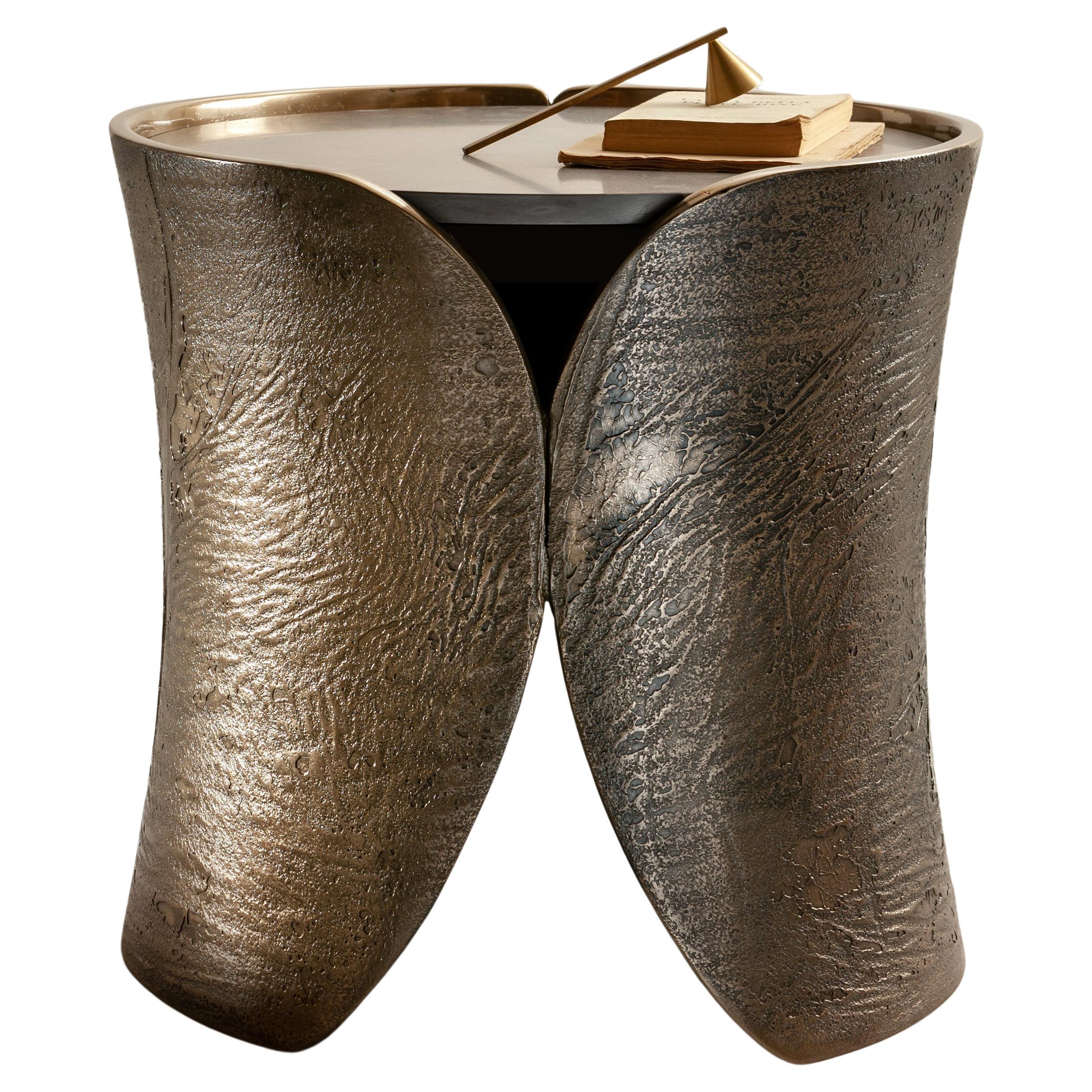 https://a.1stdibscdn.com/laurameroni-hugs-rounded-low-table-in-raptor-liquid-metal-for-sale/f_52792/f_309880321666618533951/f_30988032_1666618535323_bg_processed.jpg