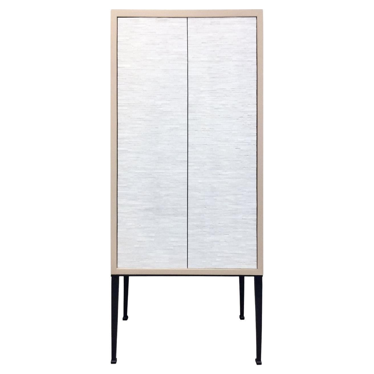 https://a.1stdibscdn.com/modern-industrial-2-door-bar-cabinet-with-white-glass-mosaic-by-ercole-home-for-sale/f_42371/f_311001321667316385686/f_31100132_1667316385942_bg_processed.jpg