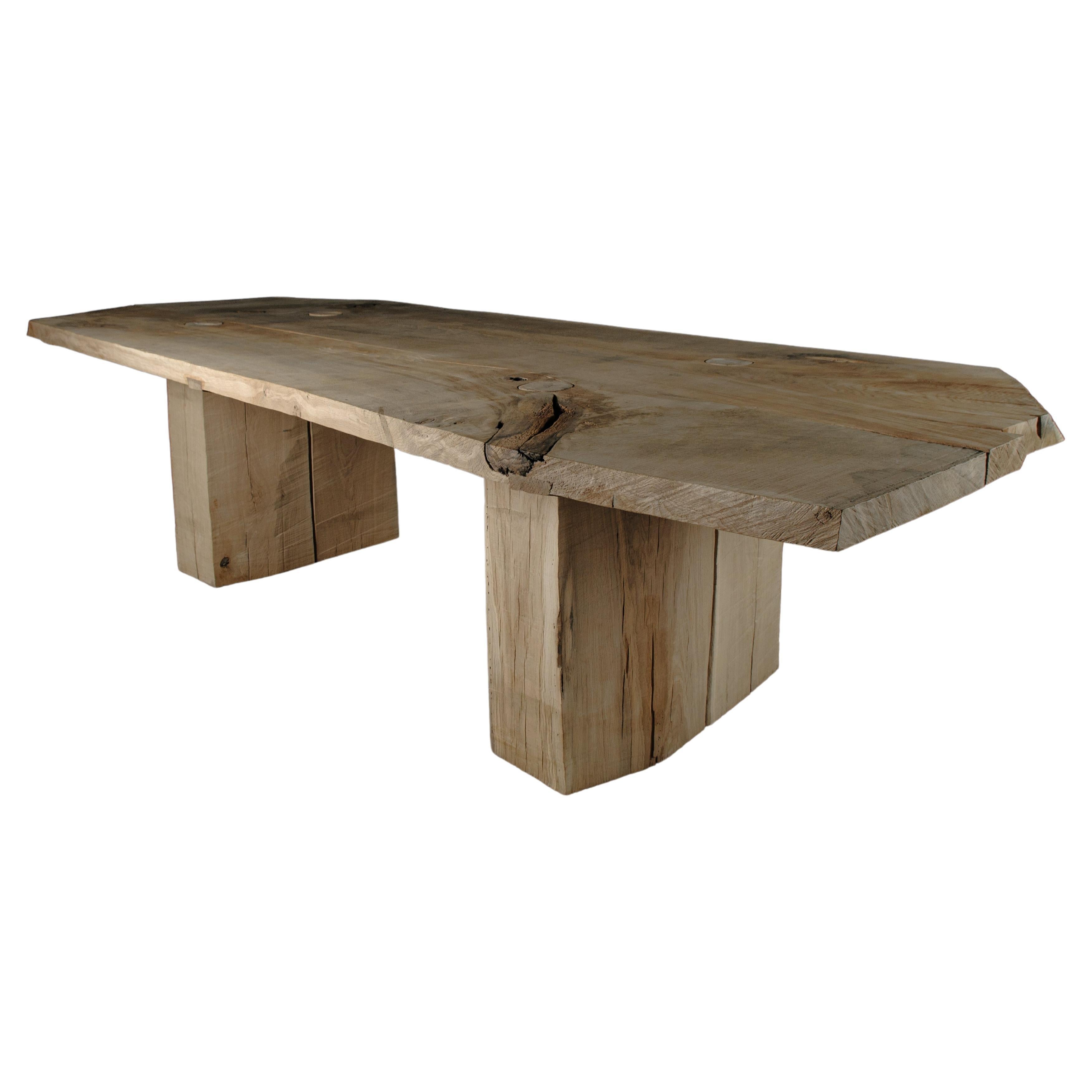 https://a.1stdibscdn.com/sculpted-massive-dining-table-v10-in-solid-oakwood-in-stock-for-sale/f_31233/f_312498321668089324592/f_31249832_1668089325793_bg_processed.jpg