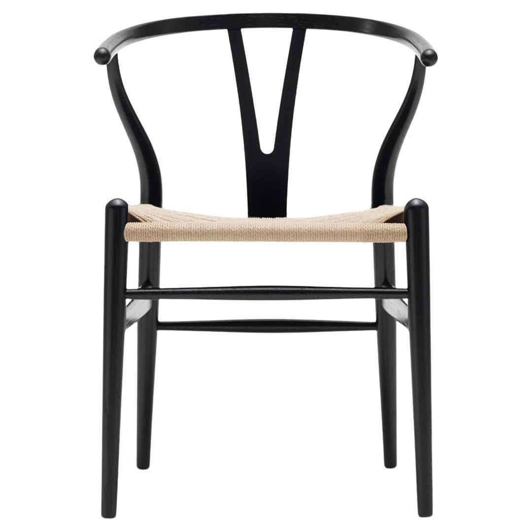 https://a.1stdibscdn.com/hans-j-wegner-ch24-wishbone-chair-in-oak-black-paint-for-carl-hansen-son-for-sale/f_14472/f_317020921670875106787/f_31702092_1670875107080_bg_processed.jpg