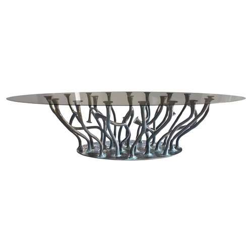 https://a.1stdibscdn.com/in-stock-amorphous-dining-table-bronze-finish-for-sale/f_27693/f_317044821764925071591/f_31704482_1764925072399_bg_processed.jpg