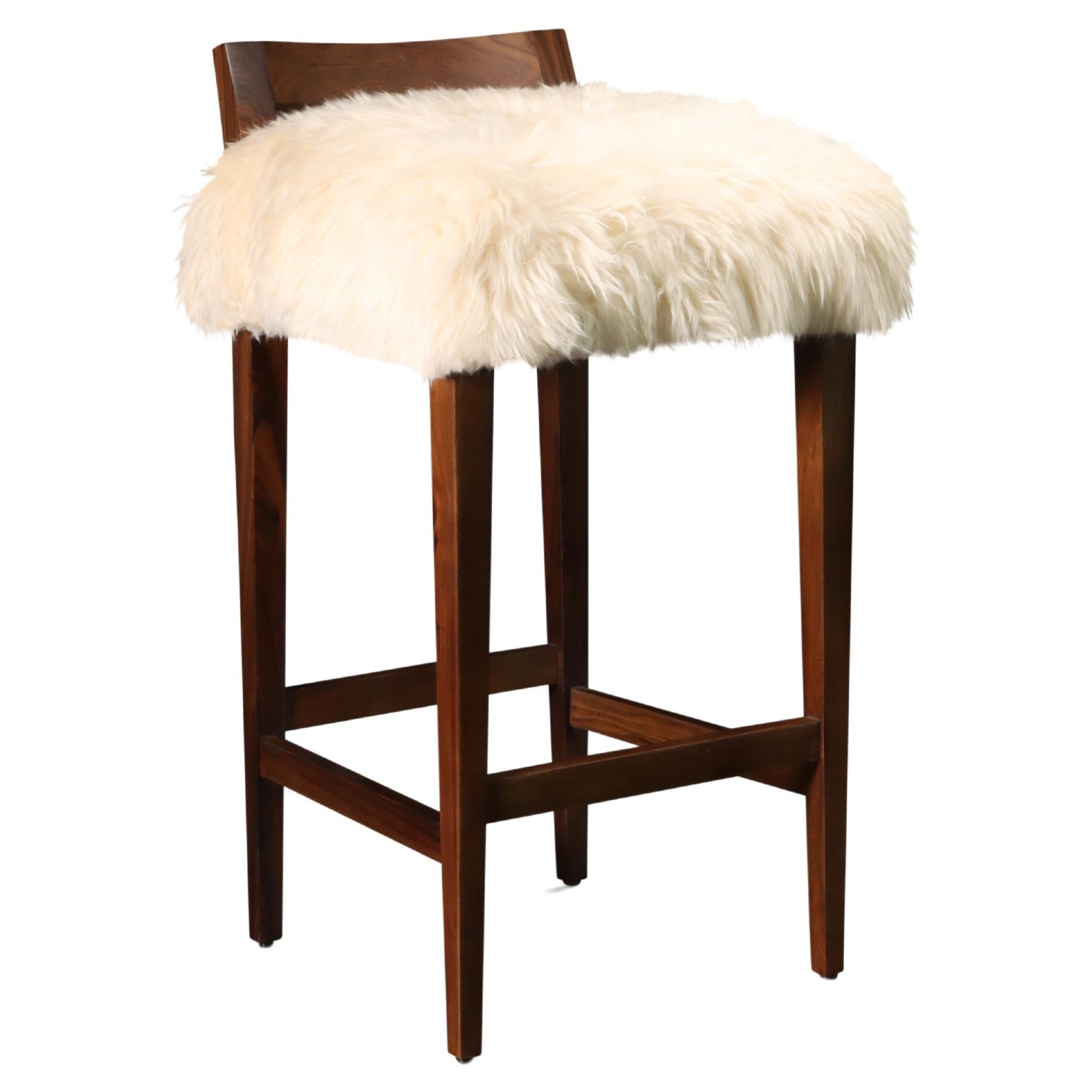 https://a.1stdibscdn.com/sheepskin-and-exotic-wood-contemporary-low-back-stool-from-costantini-umberto-for-sale/f_25173/f_318617921674587614644/f_31861792_1674587615309_bg_processed.jpg