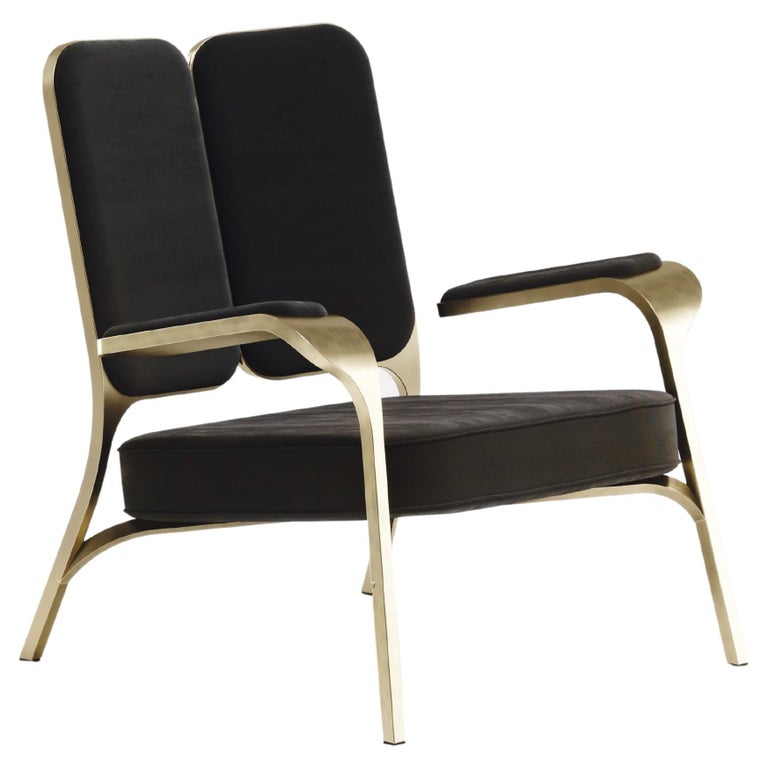 https://a.1stdibscdn.com/upholstered-armchair-with-bronze-patina-brass-details-by-ry-augousti-for-sale/f_45491/f_320557121672878964629/f_32055712_1672878965161_bg_processed.jpg?width=768