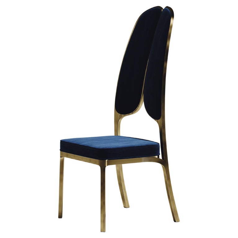 https://a.1stdibscdn.com/upholstered-dining-chair-with-bronze-patina-brass-details-by-ry-augousti-for-sale/f_45491/f_320580421672900806072/f_32058042_1672900806670_bg_processed.jpg?width=768
