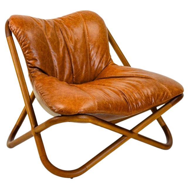 https://a.1stdibscdn.com/astral-brazilian-contemporary-wood-and-leather-easychair-by-lattoog-for-sale/f_34261/f_322621221674572887125/f_32262122_1674572887376_bg_processed.jpg