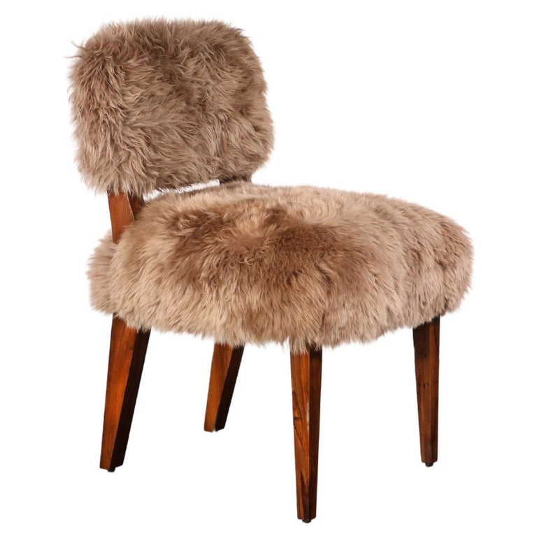 https://a.1stdibscdn.com/modern-dining-chair-in-exotic-wood-and-sheepskin-from-costantini-bruno-ovino-for-sale/f_25173/f_323976021674588627837/f_32397602_1674588628322_bg_processed.jpg?width=768