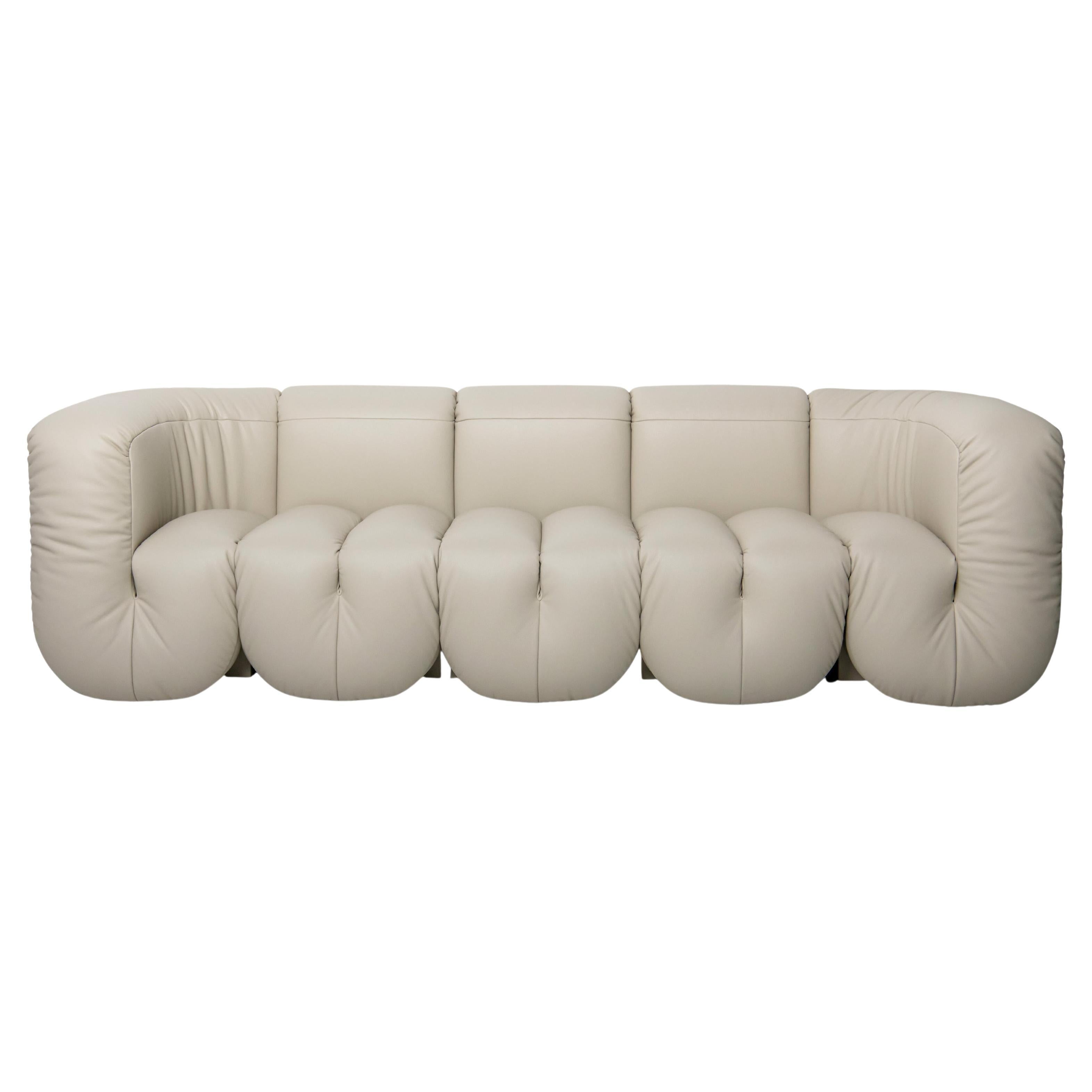 https://a.1stdibscdn.com/de-sede-ds-707-sofa-in-perla-touch-leather-upholstery-by-philippe-malouin-for-sale/22569652/f_324091221674648534619/f_32409122_1674648535490_bg_processed.jpg