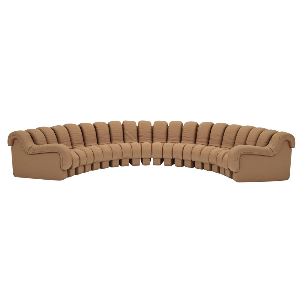 https://a.1stdibscdn.com/de-sede-ds-600-non-stop-shape-modular-sofa-in-adjustable-elements-for-sale/22569652/f_324455221674811566705/f_32445522_1674811567239_bg_processed.jpg