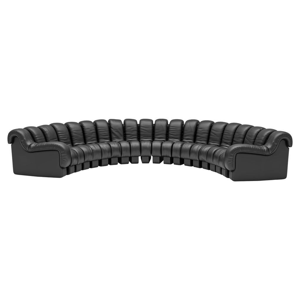 https://a.1stdibscdn.com/de-sede-ds-600-nonstop-snake-shaped-modular-sofa-in-black-leather-for-sale/22569652/f_324476721674816497937/f_32447672_1674816498627_bg_processed.jpg
