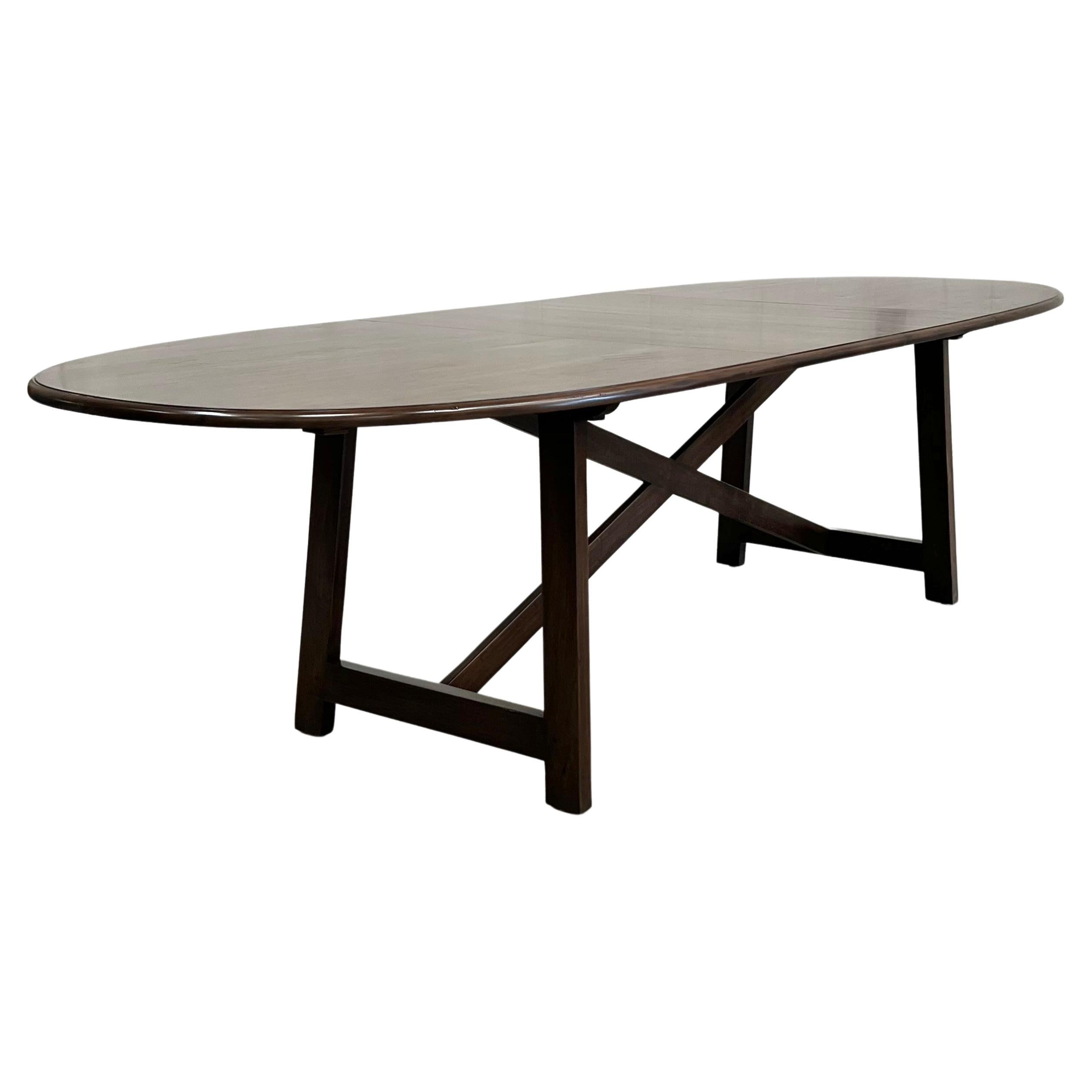 https://a.1stdibscdn.com/expandable-walnut-dining-table-for-sale/f_8065/f_324847421675026609735/f_32484742_1675026610402_bg_processed.jpg