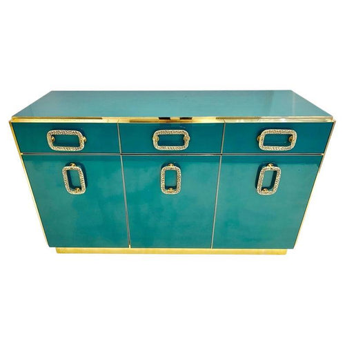 https://a.1stdibscdn.com/bespoke-italian-art-design-brass-metallic-emerald-blue-glass-dresser-sideboard-for-sale/f_9112/f_325043521675107520971/f_32504352_1675107521146_bg_processed.jpg