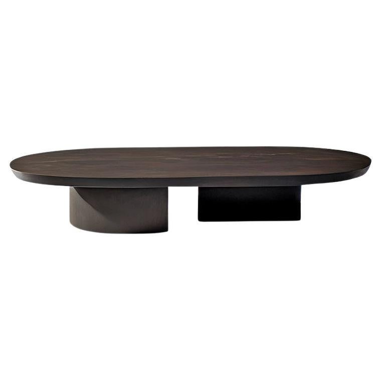 https://a.1stdibscdn.com/hand-crafted-solid-dark-wood-oval-coffee-table-by-nono-for-sale/f_39563/f_325815721675444973986/f_32581572_1675444974104_bg_processed.jpg