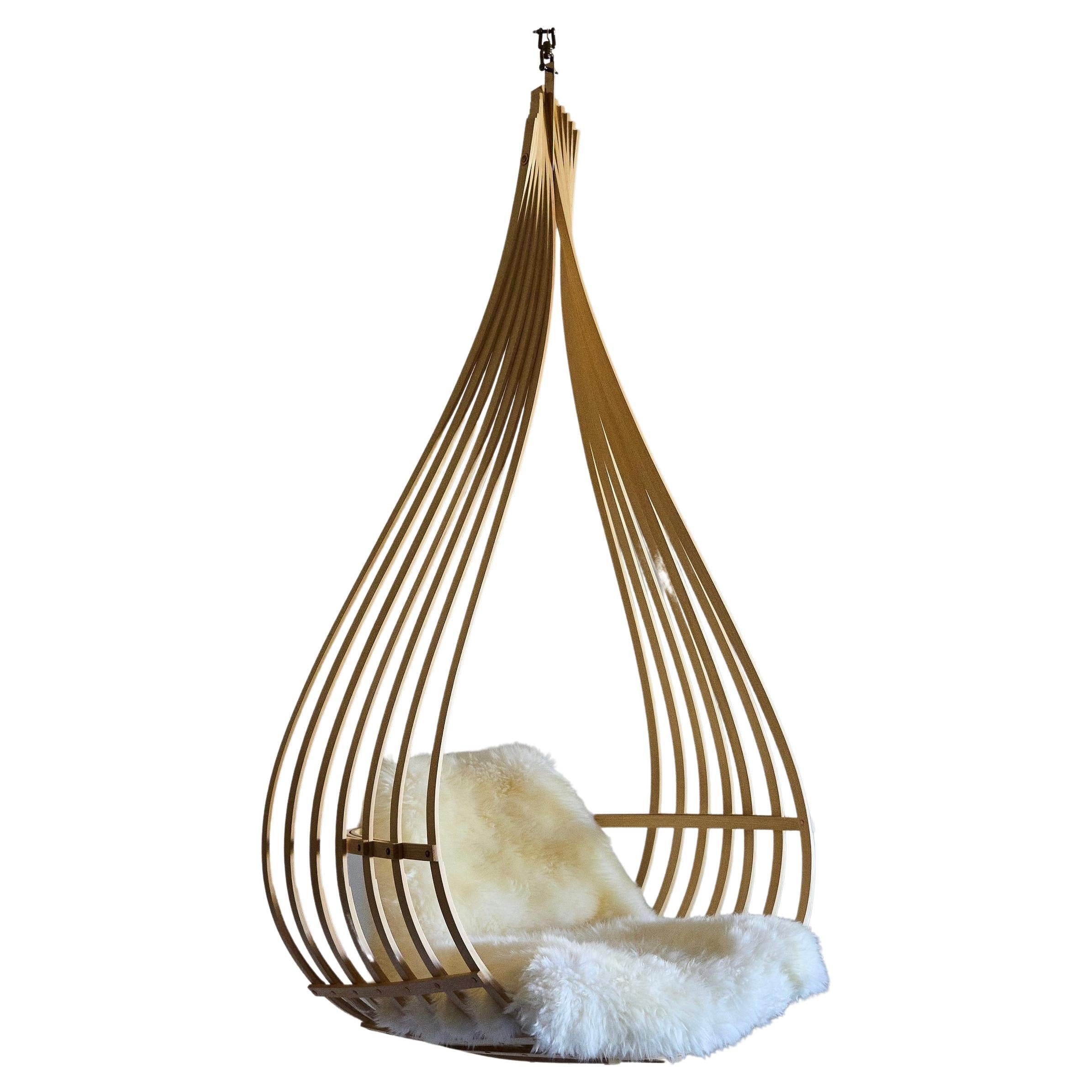 https://a.1stdibscdn.com/le-nid-hanging-chair-for-sale/f_81832/f_327362821676234927744/f_32736282_1676234928400_bg_processed.jpg