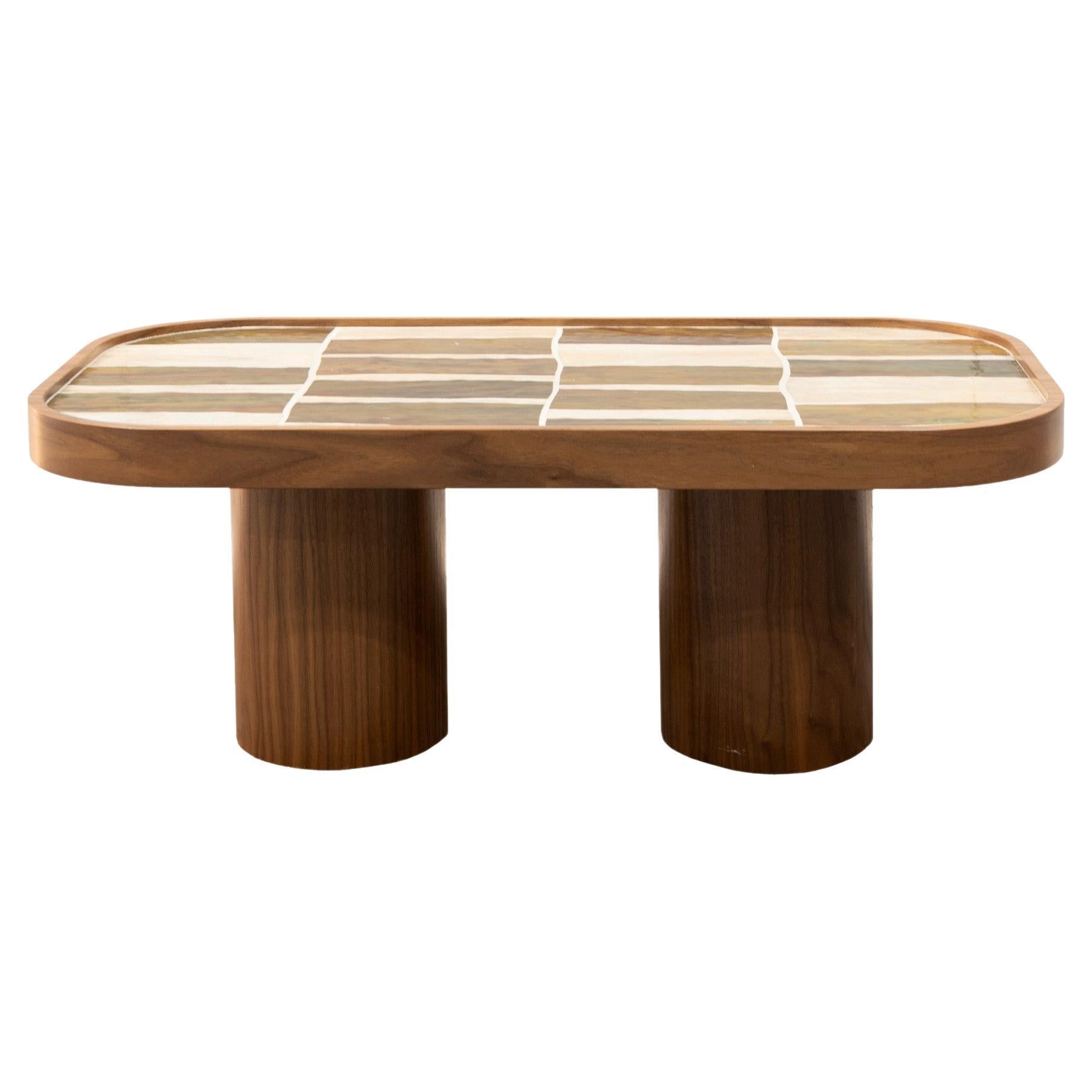 https://a.1stdibscdn.com/modern-oval-coffee-table-in-walnut-wood-cylinder-base-and-glass-by-ercole-home-for-sale/f_42371/f_356500521691686850344/f_32789682_1676484666644_bg_processed.jpg