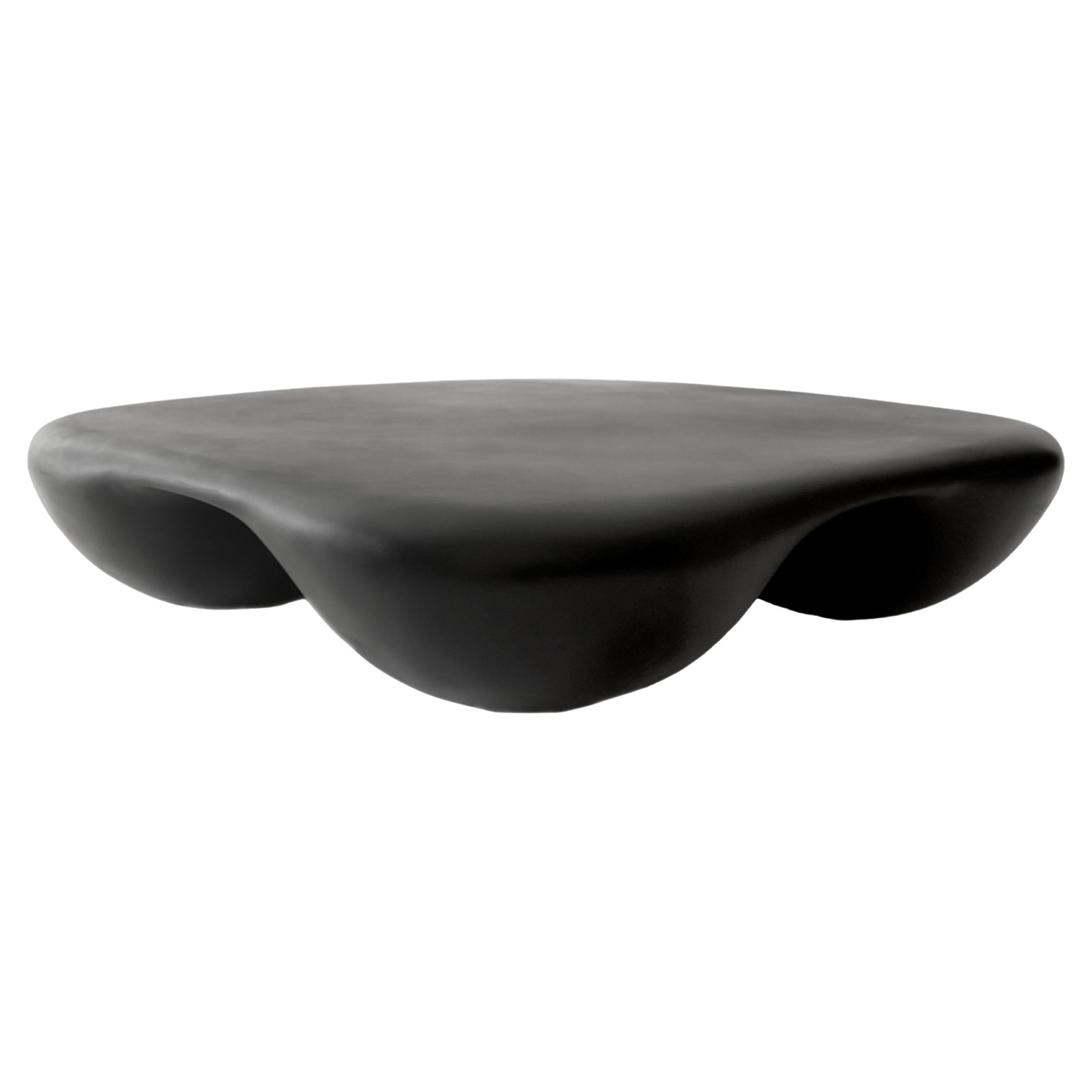 https://a.1stdibscdn.com/black-rounded-square-quad-coffee-table-in-stone-composite-by-mike-ruiz-serra-for-sale/f_37133/f_329003021677262882338/f_32900302_1677262883135_bg_processed.jpg