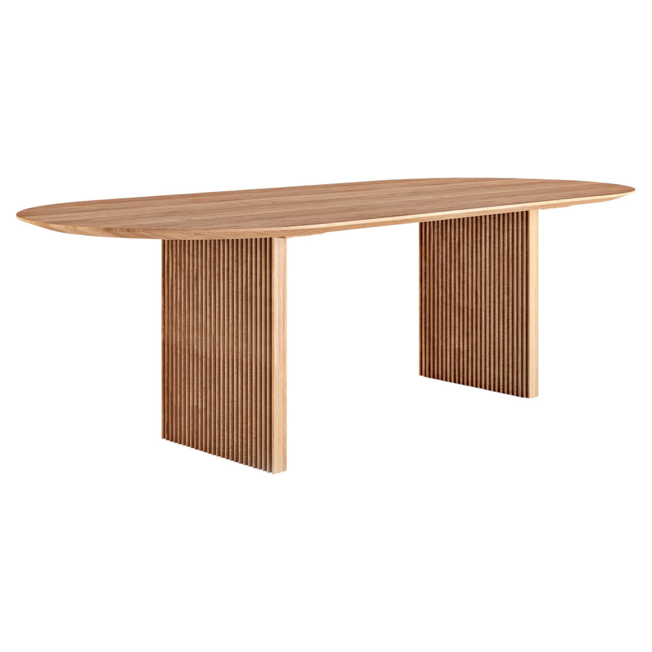 https://a.1stdibscdn.com/contemporary-oval-ten-table-270-light-oak-for-sale/f_31233/f_329350821677168994696/f_32914872_1677081118065_bg_processed.jpg