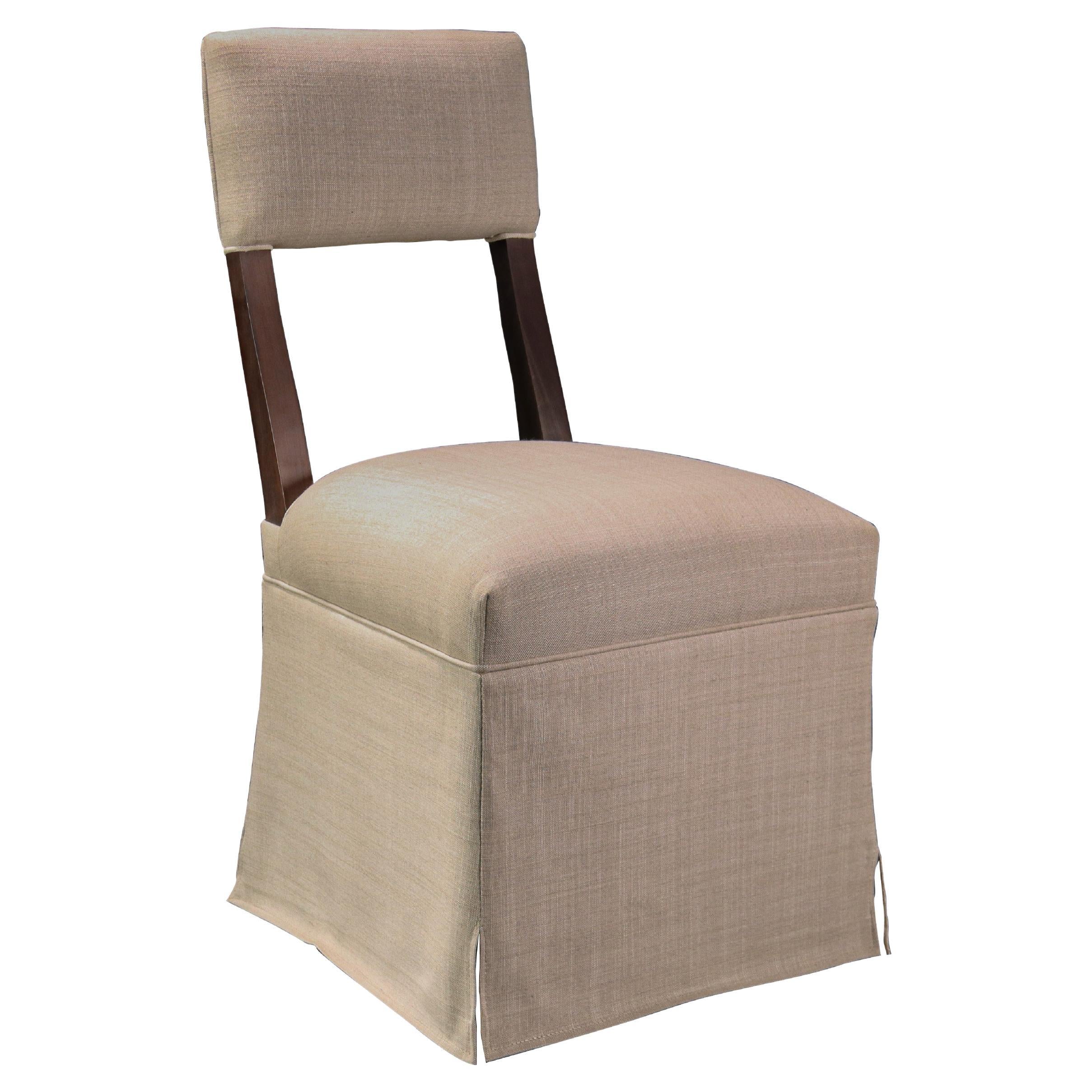 https://a.1stdibscdn.com/elegant-modern-upholstered-dining-chair-with-com-skirt-luca-from-costantini-for-sale/f_25173/f_330312221677606693621/f_33031222_1677606694718_bg_processed.jpg
