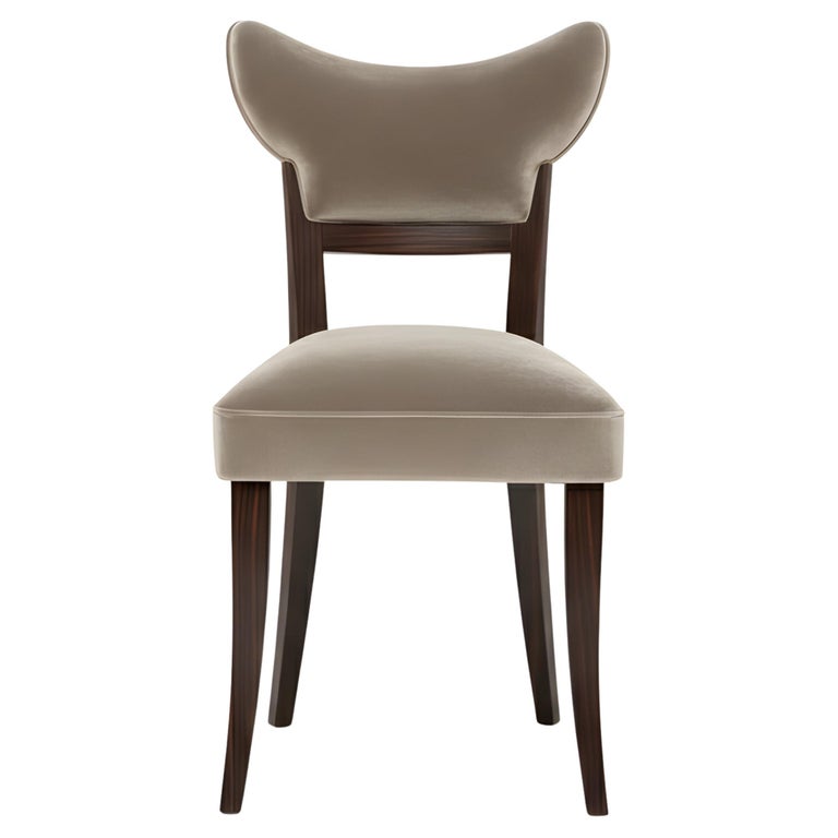 https://a.1stdibscdn.com/handcrafted-velvet-dining-chair-in-retro-silhouette-for-sale/f_27693/f_330814721772020075668/f_33081472_1772020076114_bg_processed.jpg?width=768