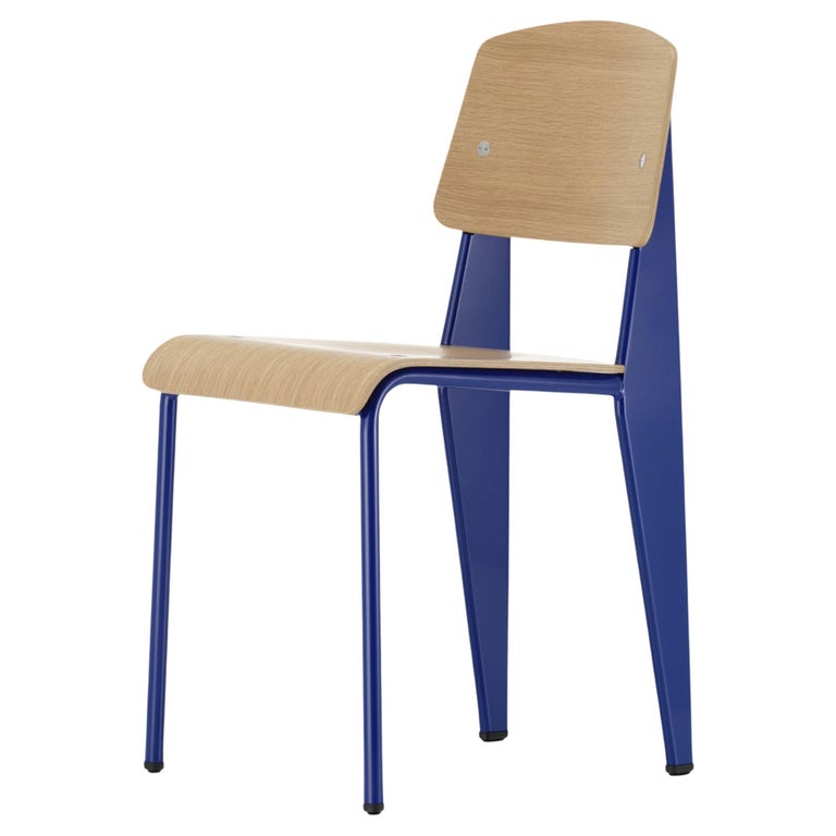https://a.1stdibscdn.com/jean-prouve-standard-chair-in-natural-oak-and-blue-metal-for-vitra-for-sale/f_14472/f_331589321678133632900/f_33158932_1678133633508_bg_processed.jpg?width=768