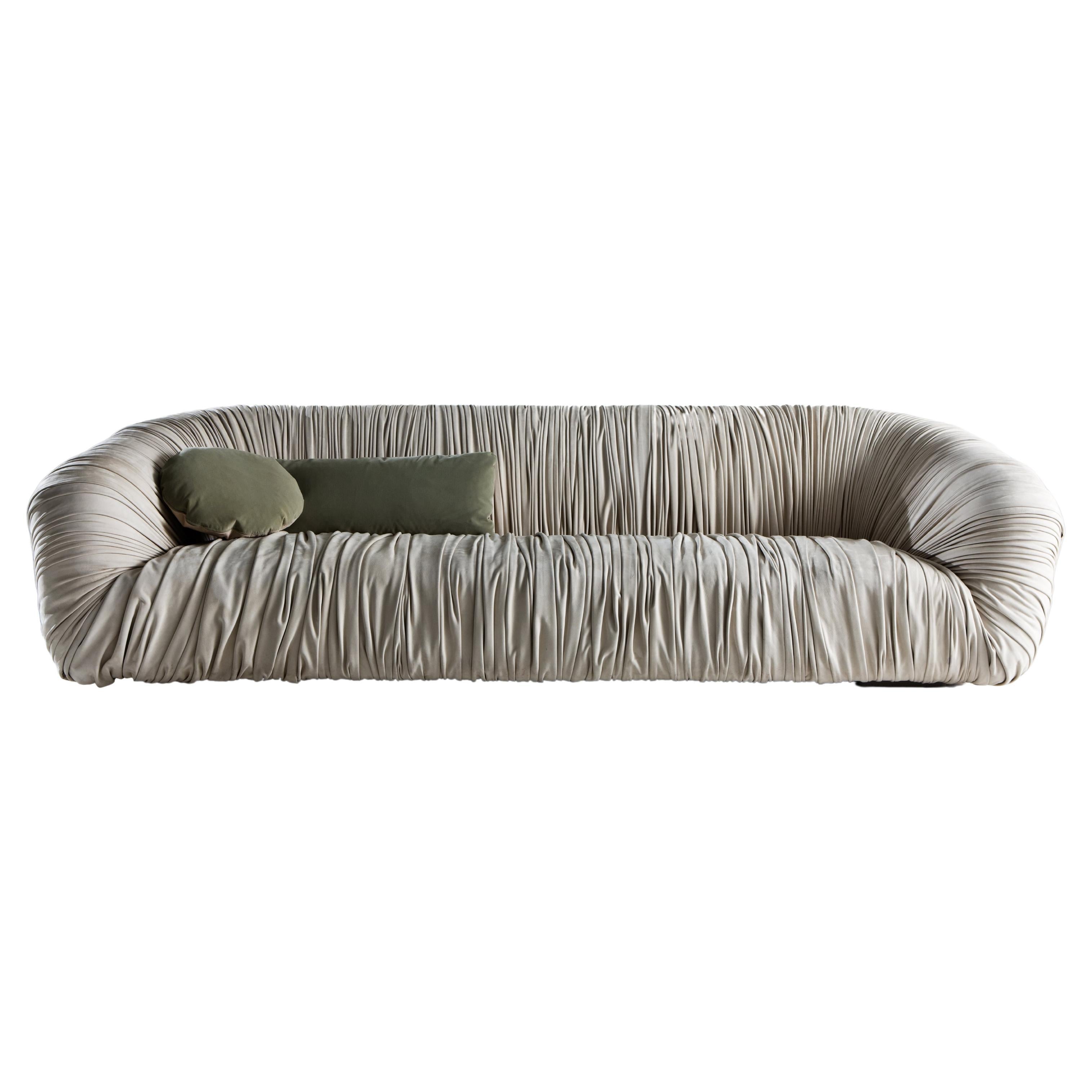 https://a.1stdibscdn.com/laurameroni-custom-draped-sofa-drape-in-leather-or-velvet-for-sale/f_52792/f_332793821678786041550/f_33279382_1678786042573_bg_processed.jpg
