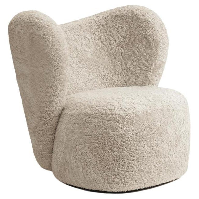 https://a.1stdibscdn.com/little-big-chair-swivel-armchair-in-sheepskin-moonlight-by-norr11-for-sale/f_31233/f_334393721679568135133/f_33439372_1679568135353_bg_processed.jpg?width=768