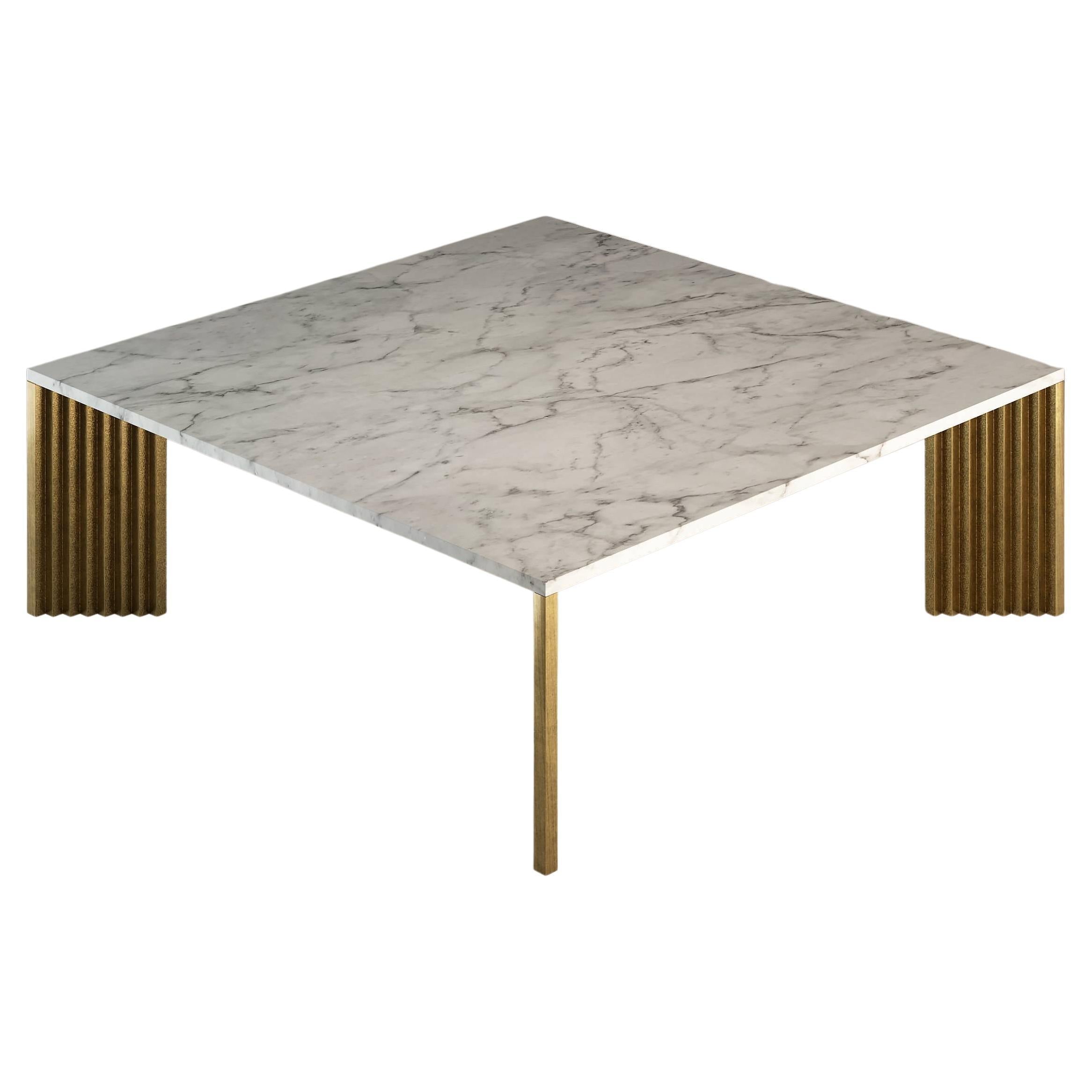 https://a.1stdibscdn.com/piero-coffee-table-with-cast-brass-legs-and-white-carrara-marble-top-for-sale/f_22063/f_335840321680266391439/f_33584032_1680266392070_bg_processed.jpg