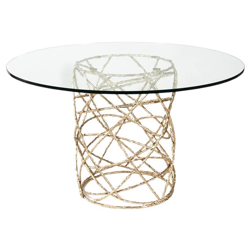 https://a.1stdibscdn.com/cast-solid-brass-dining-table-with-glass-top-for-sale/f_27693/f_337515021681226230241/f_33751502_1681226230570_bg_processed.jpg