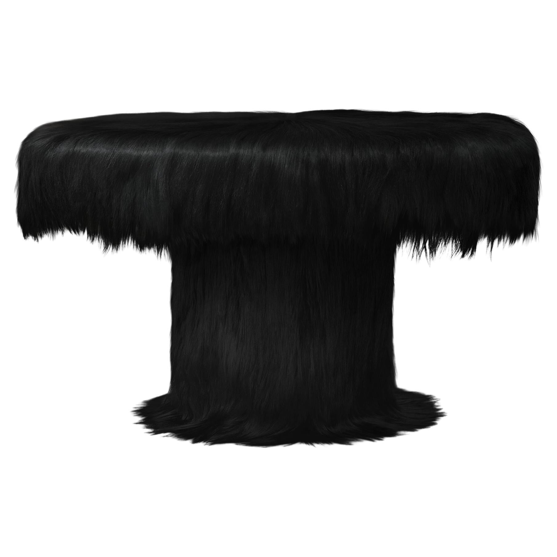 https://a.1stdibscdn.com/black-raw-table-with-furry-goatskin-and-nubuck-by-atelier-vf-for-sale/f_70152/f_337756321681323373023/f_33775632_1681323373491_bg_processed.jpg