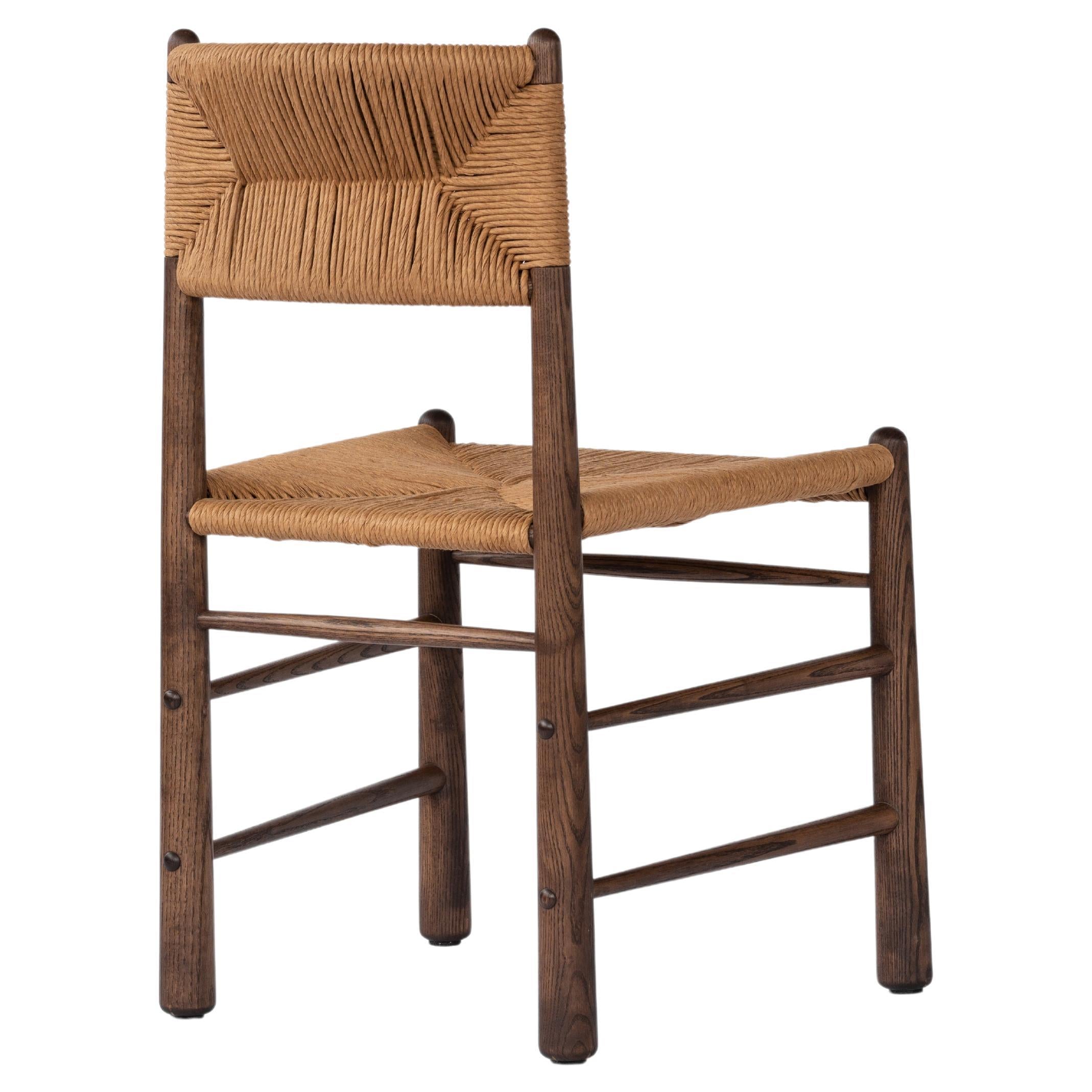 https://a.1stdibscdn.com/ewa-dining-chair-walnut-with-natural-fiber-rush-woven-seat-and-backrest-for-sale/f_26683/f_346922321686330353195/f_34692232_1686330353871_bg_processed.jpg
