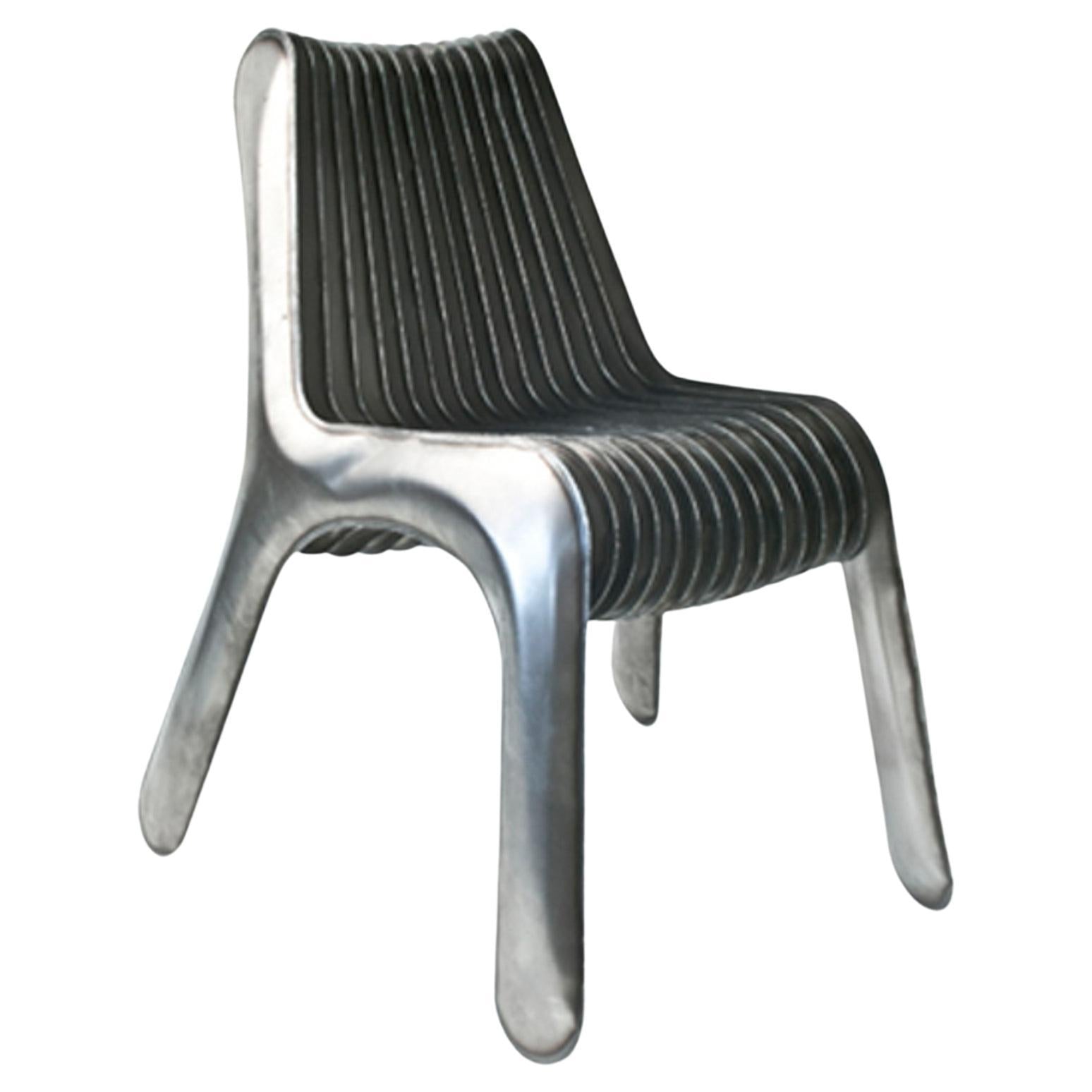 https://a.1stdibscdn.com/steel-in-rotation-chair-by-zieta-polished-stainless-steel-for-sale/f_31233/f_348056421686925728484/f_34805642_1686925729047_bg_processed.jpg