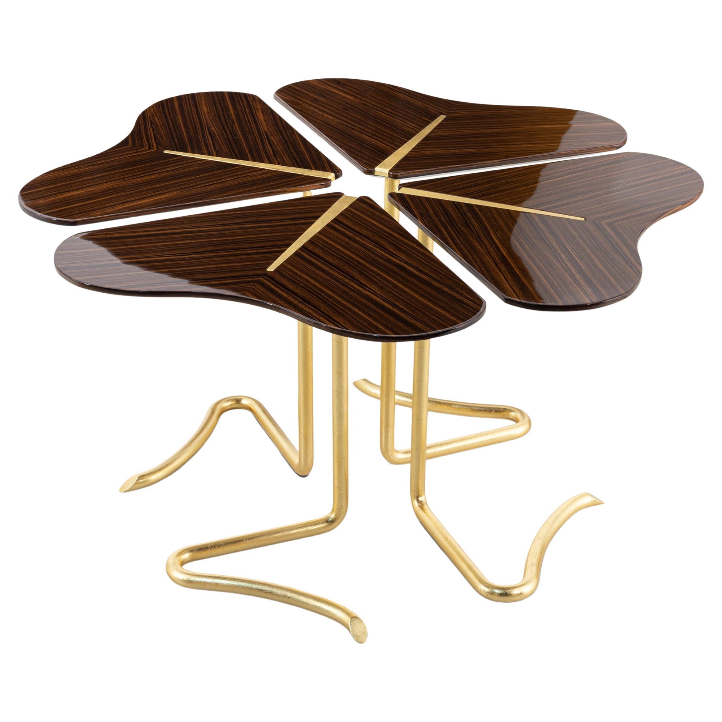 https://a.1stdibscdn.com/four-for-luck-coffee-table-ebony-gold-insidherland-by-joana-santos-barbosa-for-sale/f_53652/f_348556621687261511618/f_34855662_1687261512530_bg_processed.jpg