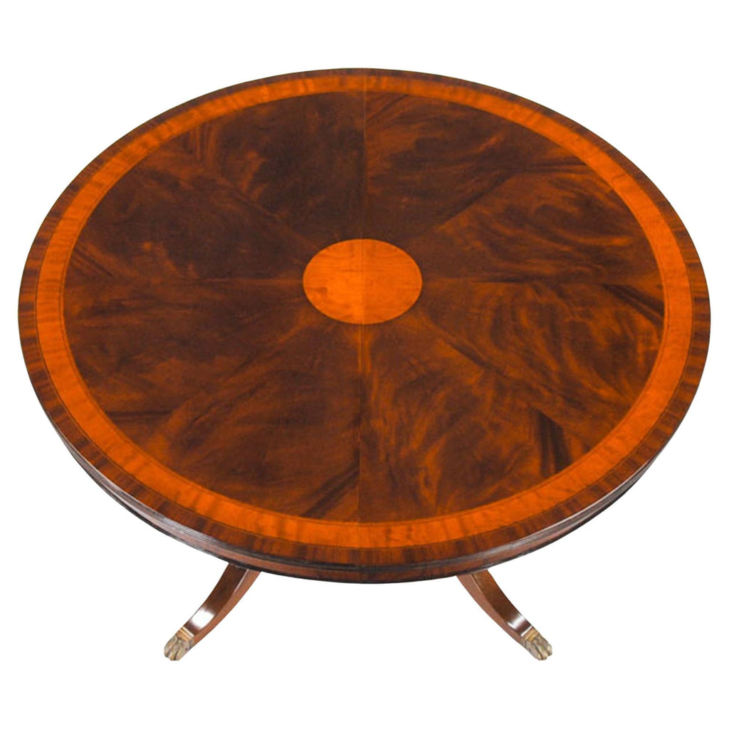 https://a.1stdibscdn.com/54-90-round-mahogany-table-for-sale/f_85472/f_350141121688049958204/f_35014112_1688049958948_bg_processed.jpg