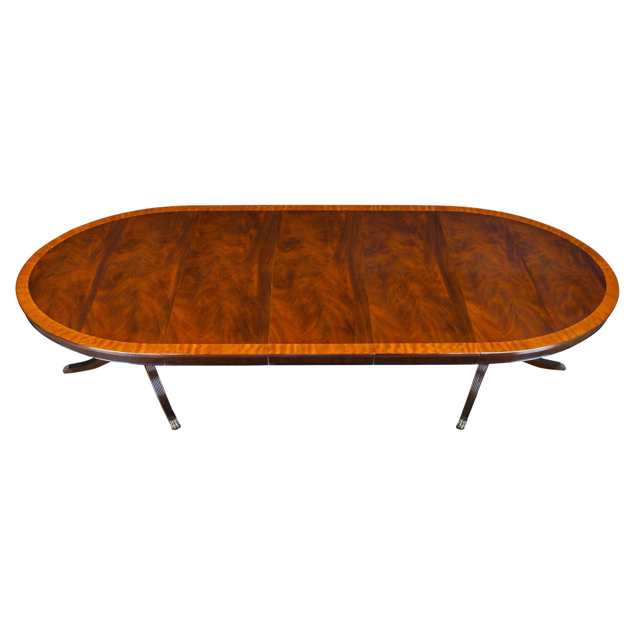 https://a.1stdibscdn.com/long-oval-mahogany-dining-table-for-sale/f_85472/f_350306521688133278577/f_35030652_1688133279128_bg_processed.jpg
