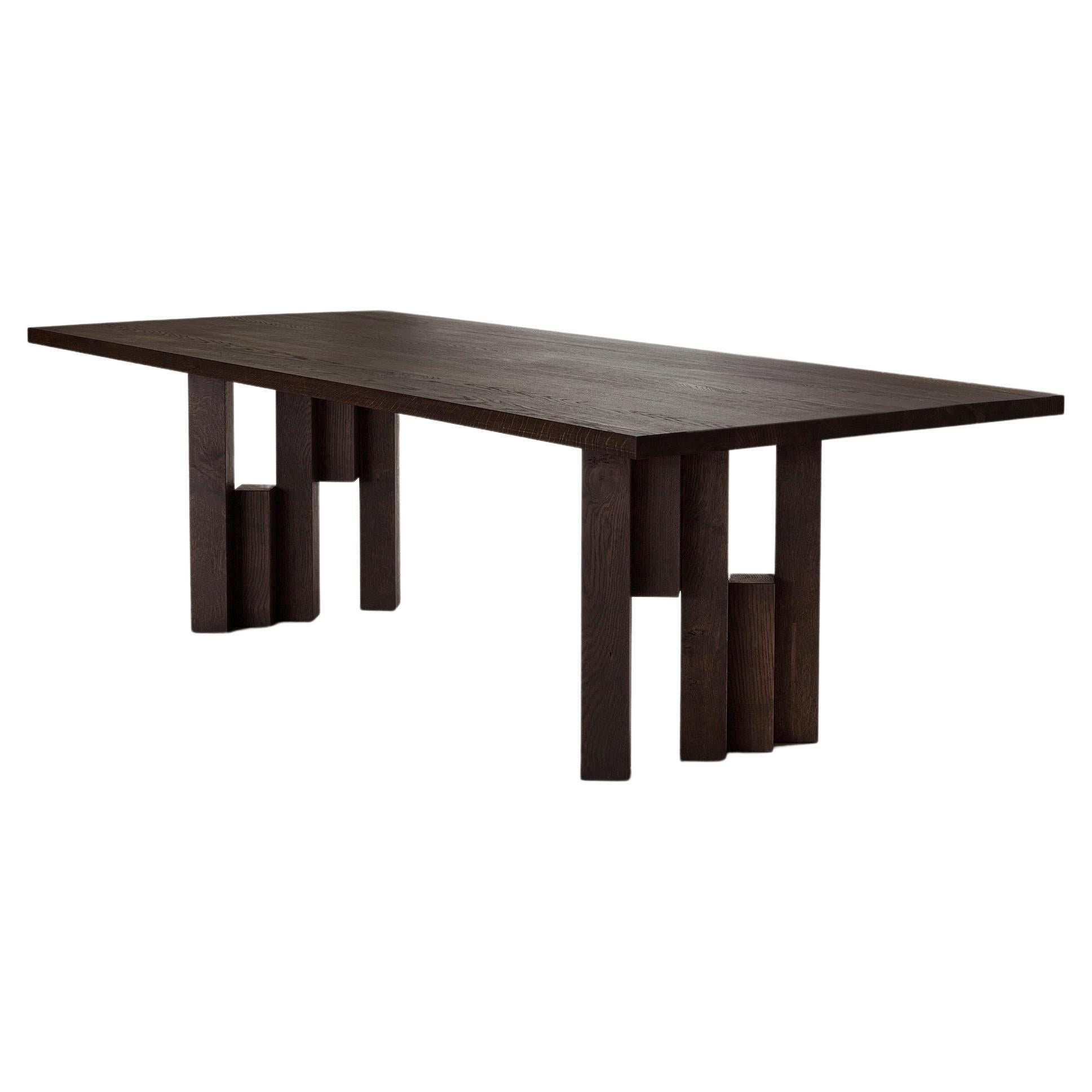 https://a.1stdibscdn.com/sculptural-solid-wooden-fenestra-dining-table-for-sale/f_89302/f_352850121689669949394/f_35285012_1689669949829_bg_processed.jpg