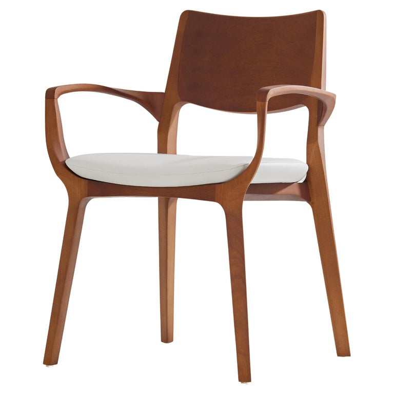 https://a.1stdibscdn.com/post-modern-style-aurora-chair-in-honey-solid-wood-vegan-leather-seating-for-sale/f_35593/f_358034721692649153006/f_35803472_1692649153955_bg_processed.jpg?width=768