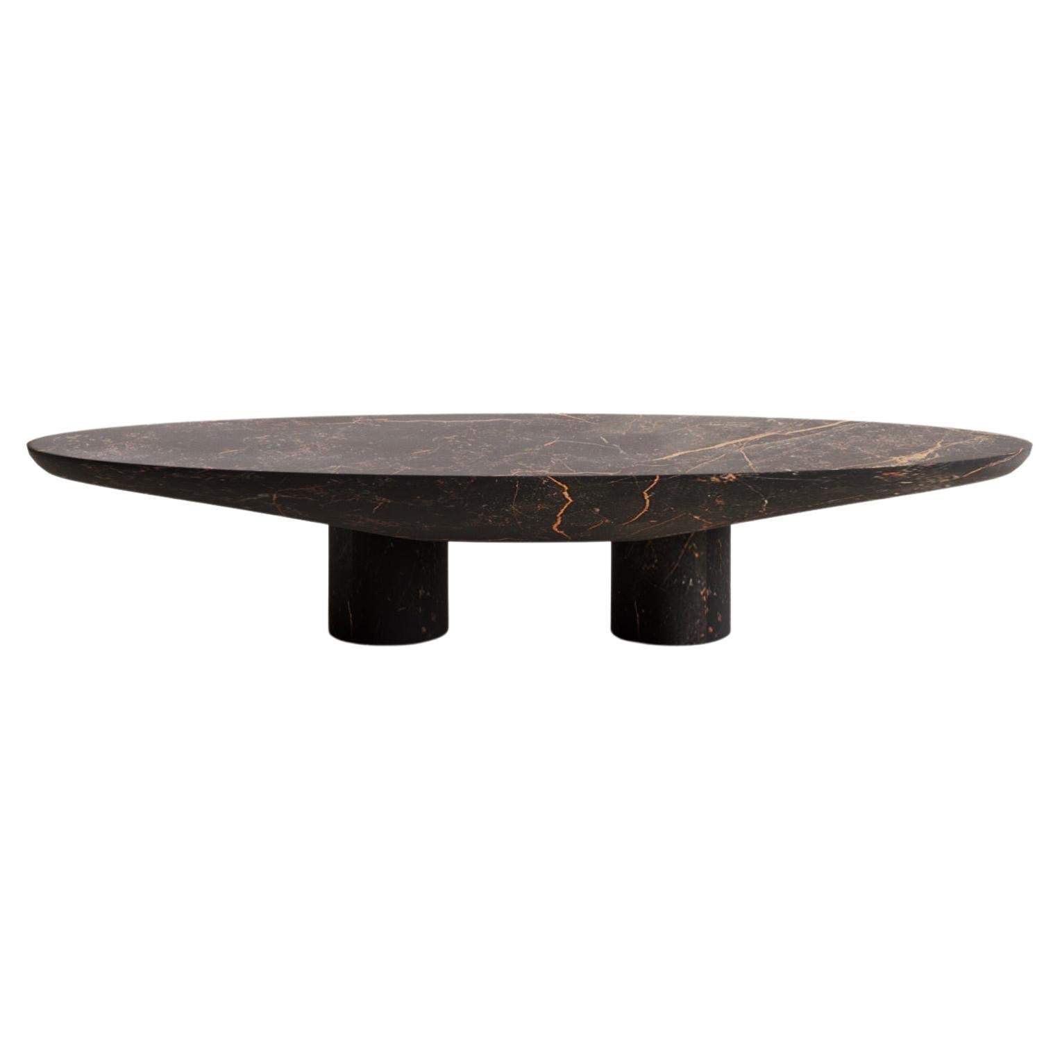 https://a.1stdibscdn.com/solid-port-saint-laurent-abraccio-oval-coffee-table-140-by-studio-narra-for-sale/f_70152/f_358443621692885416627/f_35844362_1692885416986_bg_processed.jpg