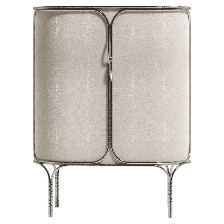 https://a.1stdibscdn.com/shagreen-bar-cabinet-with-chrome-finish-stainless-steel-details-by-ry-augousti-for-sale/f_45491/f_359495521693450653596/f_35949552_1693450654027_bg_processed.jpg?width=768