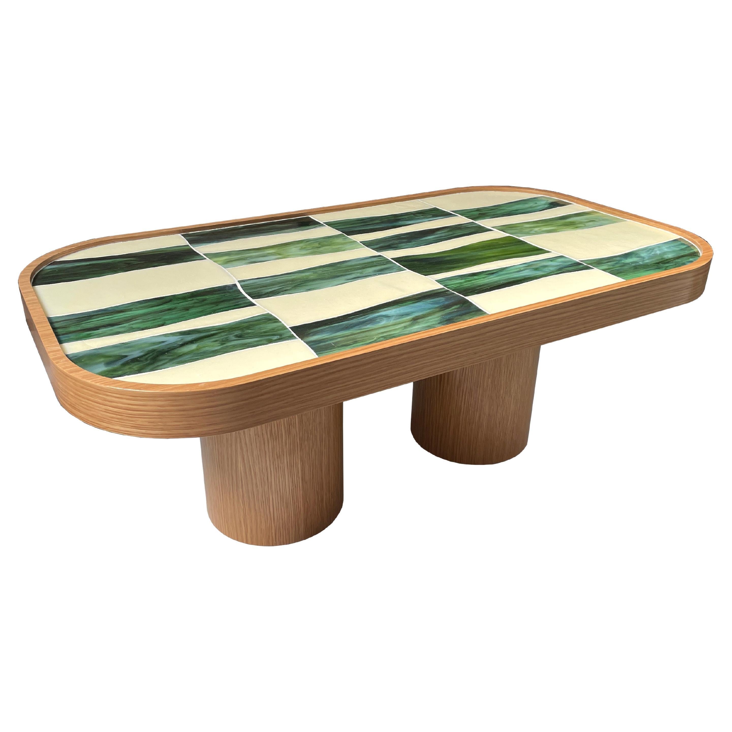 https://a.1stdibscdn.com/modern-oval-coffee-table-in-oak-wood-cylinder-base-and-glass-by-ercole-home-for-sale/f_42371/f_362106021695133766385/f_36210602_1695133767325_bg_processed.jpg
